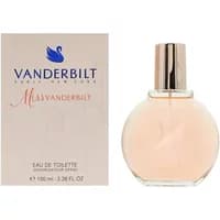 Round glass bottle of Miss Vanderbilt Eau De Toilette, pink liquid, gold cap, next to branded box with swan logo.