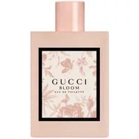 Pink Gucci Bloom Eau De Toilette 100ml bottle with floral label and black border.