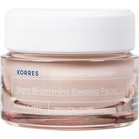 Korres Wild Rose Night-Brightening Sleeping Facial in a clear jar with white lid, 40ml, featuring white text.