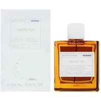 Amber square bottle of Korres White Tea Eau De Toilette 100ml with white cap and matching white box packaging.
