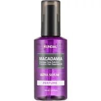 Purple bottle of KUNDAL Macadamia Hair Serum Cherry Blossom, 100ml, with black pump and white label detailing.