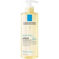 Clear bottle of La Roche-Posay Lipikar Cleansing Oil AP+ with pump dispenser, 400ml, yellow liquid inside.
