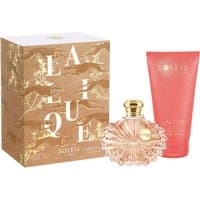 Lalique Soleil gift set with ornate glass perfume bottle and pink body lotion tube, gold-accented packaging.