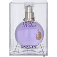 Purple spherical Lanvin Eclat D'Arpege perfume bottle with silver cap in a clear rectangular case.