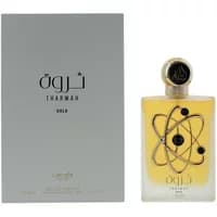 Lattafa Tharwah Gold Eau De Parfum 100ml, gold bottle with black atom design, silver cap, gray box with Arabic text.