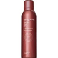 Maroon Living Proof dry shampoo bottle with white text and circular design on front.