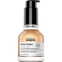 L'Oréal Professionnel Metal Detox Anti-Deposit Protector in a clear pump bottle with black cap and white label.