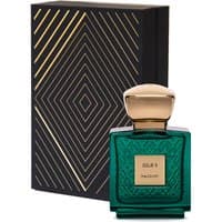 Green Majouri Jour 9 perfume bottle with gold cap, geometric pattern, and matching black box with gold lines.