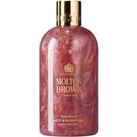 Molton Brown Rose Dunes Bath & Shower Gel, 300 ml, pink marbled bottle with gold cap and logo.