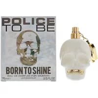 White skull-shaped Police perfume bottle with gold accents, next to matching box labeled "Born To Shine" 75ml.