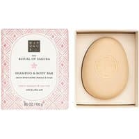 Rituals The Ritual Of Sakura oval shampoo & body bar in pink box with geometric pattern, embossed logo on bar.