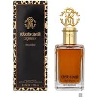 Roberto Cavalli Nero Assoluto Eau de Parfum 100ml, gold cap with ornate logo, amber liquid, leopard print box.