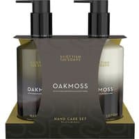 Scottish Fine Soaps Oakmoss Hand Care Set with pump bottles, black caps, and elegant packaging.