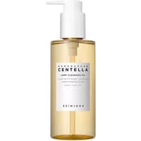 Skin1004 Centella Light Cleansing Oil 200 ml in a clear pump bottle with white label and gold liquid.