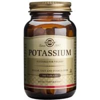 Brown glass bottle with gold cap, labeled "Solgar Potassium Gluconate 100 Tablets," suitable for vegans.
