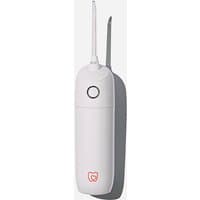 White Spotlight Oral Care water flosser with UV steriliser, sleek design, single button, and logo at the base.