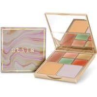 Stila Correct & Perfect palette with six colorful creams and powders in a gold compact with a marbled lid and mirror.