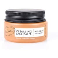 Orange jar of UpCircle Cleansing Face Balm with black lid, labeled with apricot powder, oat oil, and vitamin E.