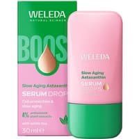 Pink and green Weleda serum bottle with matching box, labeled "Slow Ageing Astaxanthin Face Serum Drops with White Tea."