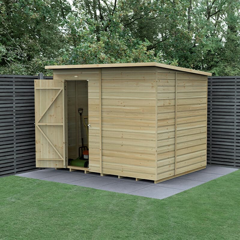 Wooden pent shed with a natural wood finish, featuring shiplap construction, a slanted roof, and a double door entrance, set on a grassy area with a backdrop of dark fencing.