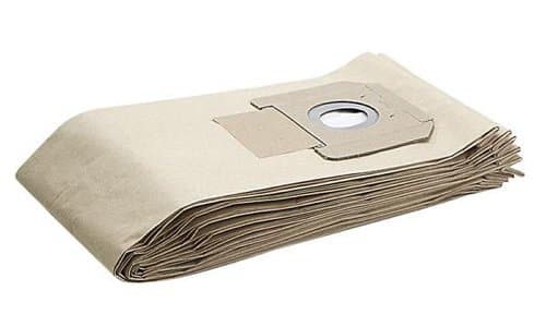 Kärcher M Class paper filter dust bags in a folded stack, featuring a beige color, sturdy material, and a circular opening for vacuum attachment.