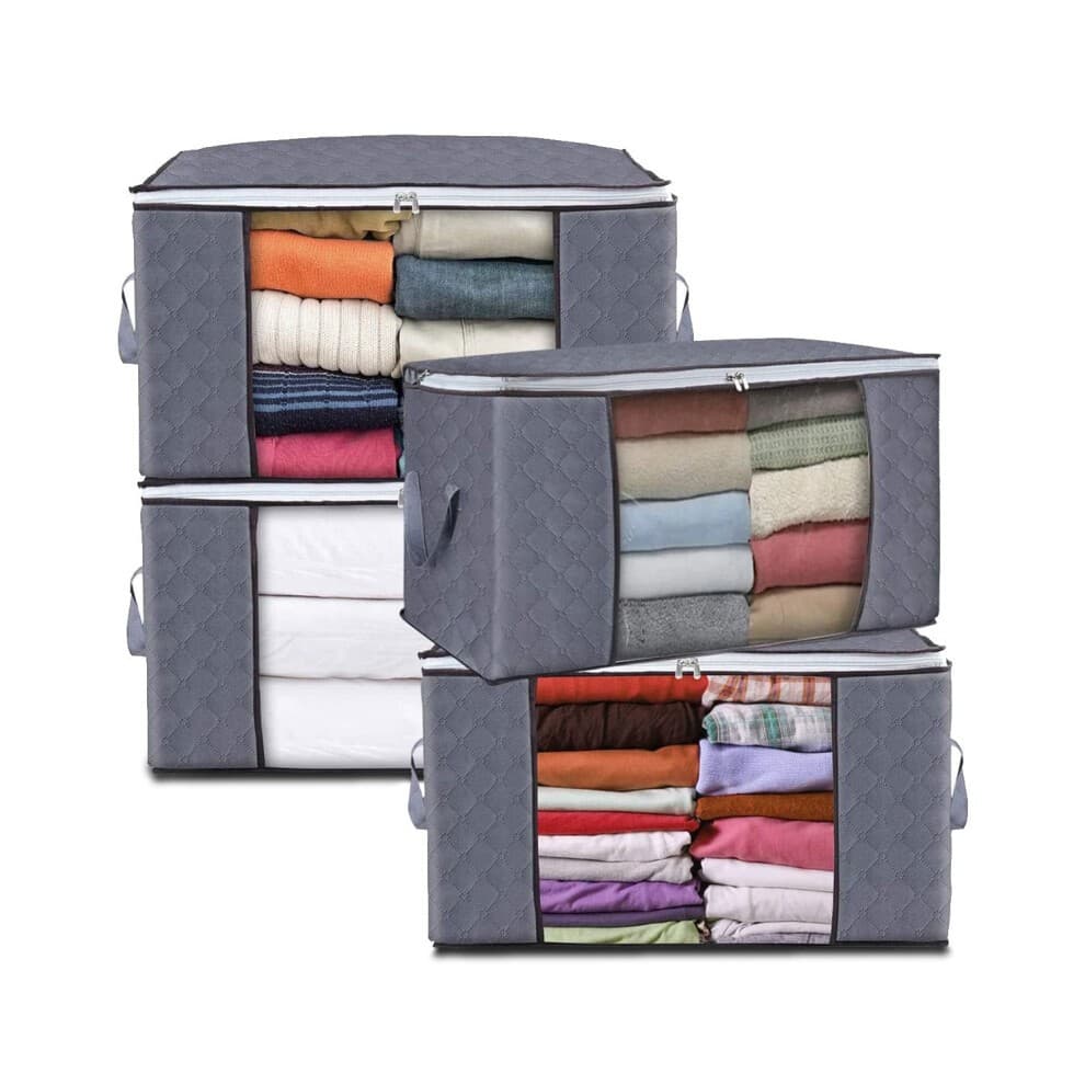 Large capacity gray fabric storage bags with zips, featuring reinforced handles, neatly organized with folded clothing and comforters, showcasing a 90L capacity.