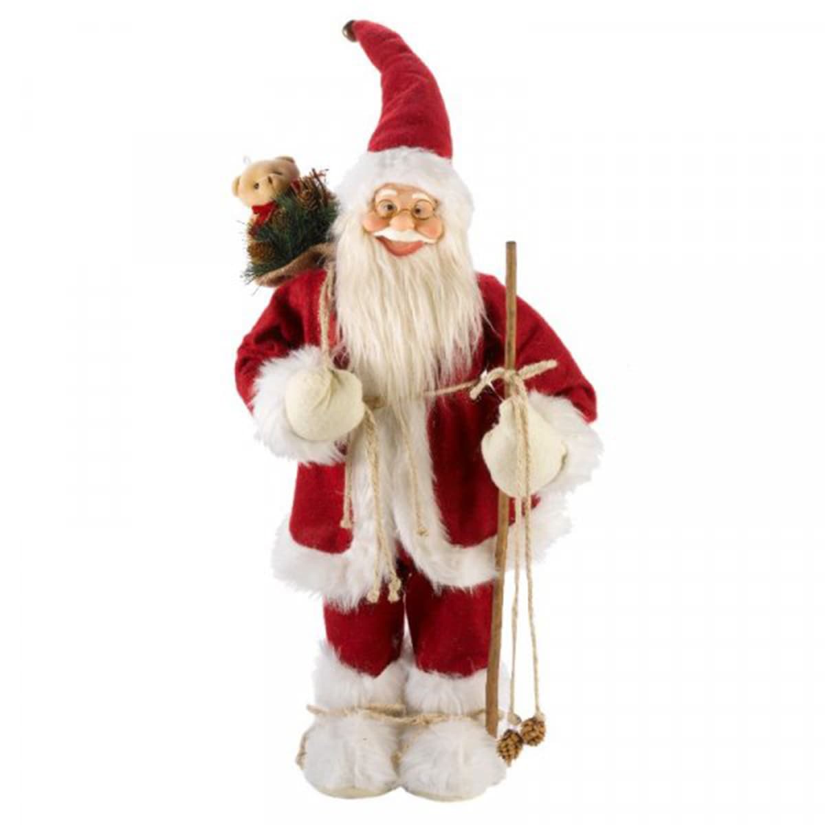 Festive red plush Father Christmas figure with a white beard, glasses, and a sack on his back, holding a staff and standing on a snowy base.