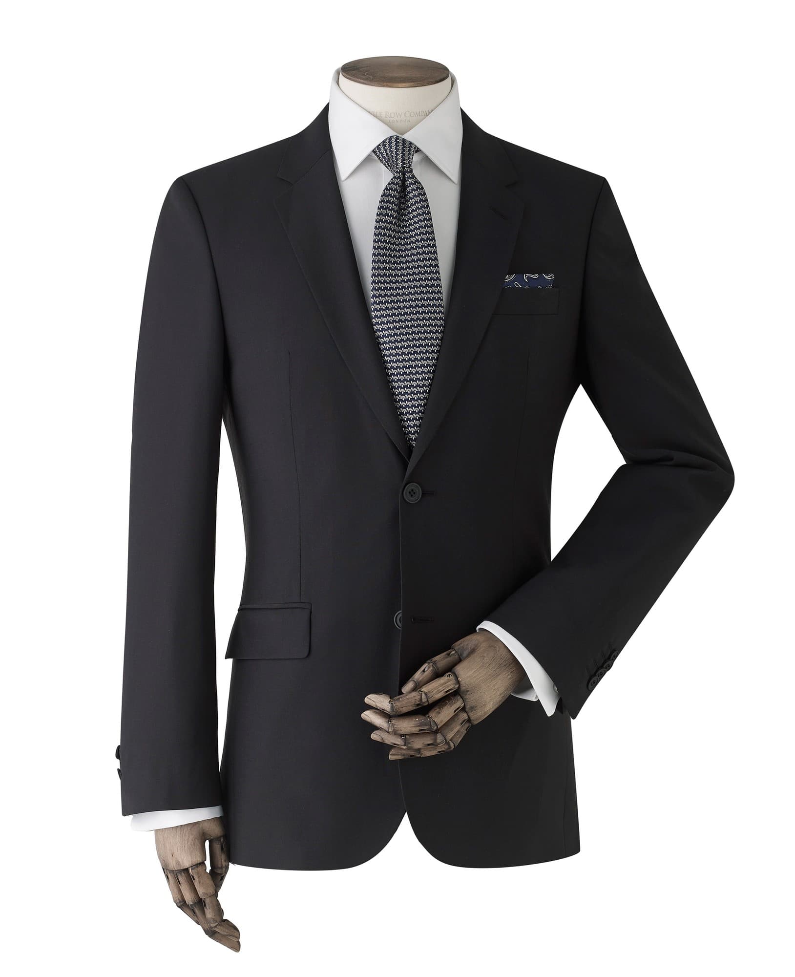 Men's black wool-blend suit jacket, size 46X short, featuring a single-button closure, notch lapels, and a stylish pocket square, displayed on a mannequin with a white shirt and patterned tie.