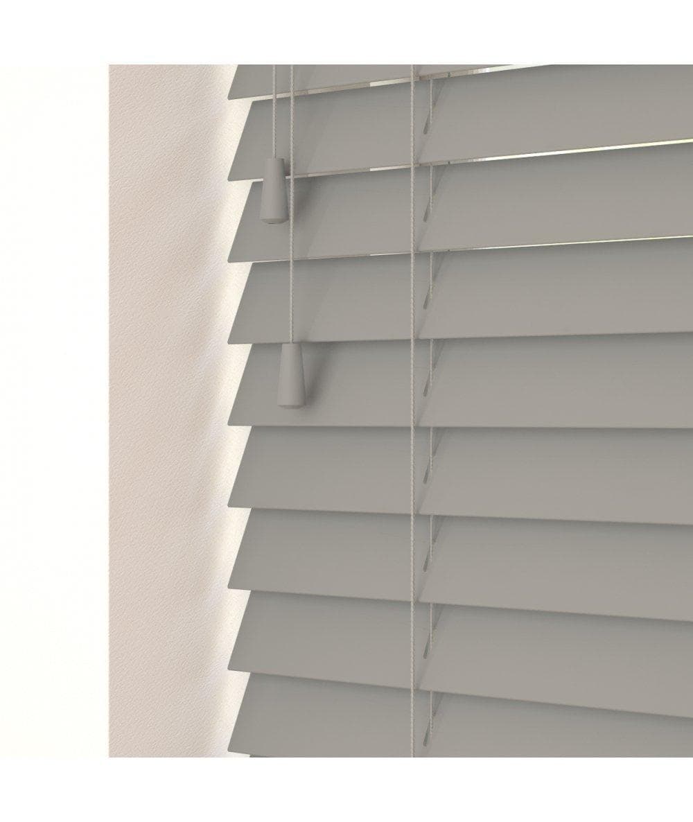 Fine grain volcanic grey blinds measuring 80cm, featuring adjustable strings and a sleek design, complementing a light-colored wall.