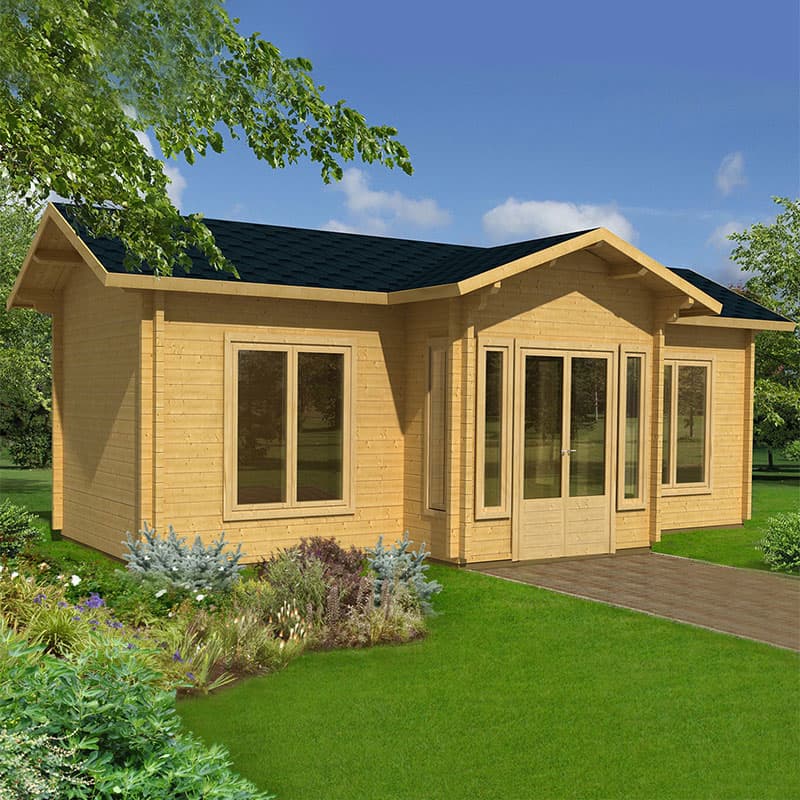 Light-colored wooden log cabin with a sloped black roof, large windows, double doors, and surrounded by greenery and a stone pathway.