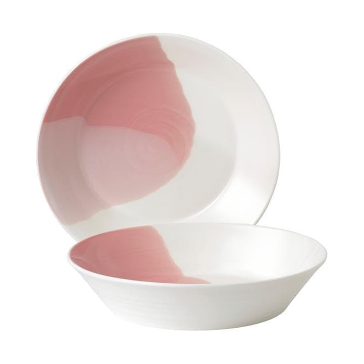 Set of two ceramic pasta bowls featuring a glossy white finish with a coral pink brushstroke design, showcasing a modern and elegant aesthetic.