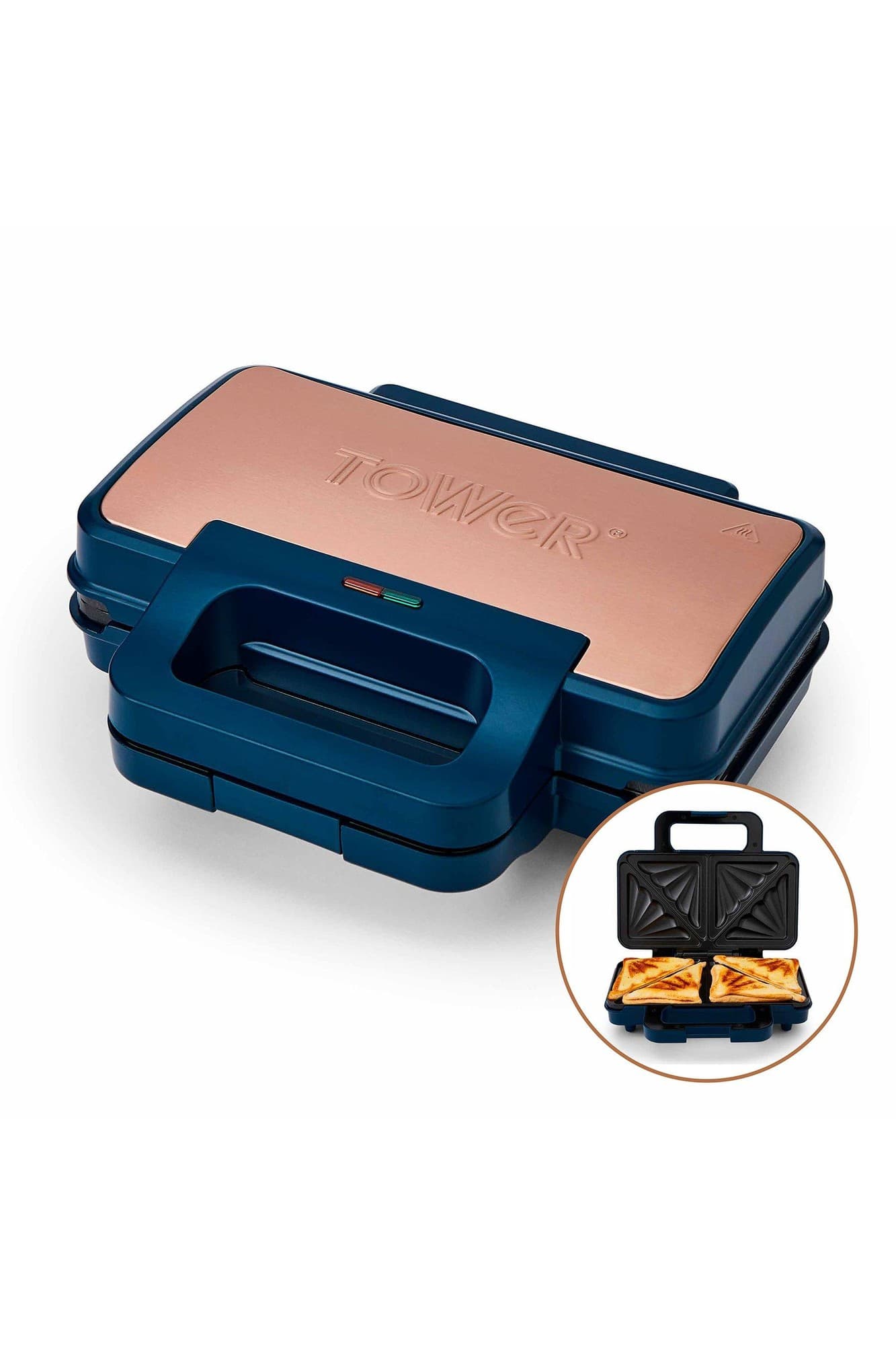 Midnight blue Tower Cavaletto 900W Sandwich Maker with a sleek design, copper accents, and a handle, featuring a cutaway showing perfectly toasted sandwiches inside.