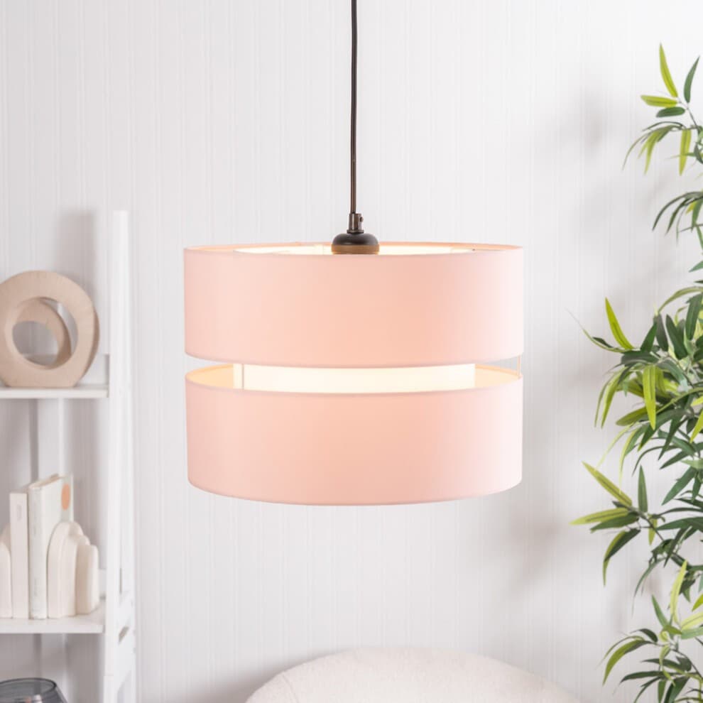 Dusty pink, double-layered drum pendant light shade with a sleek design, featuring a black hanging cord, perfect for adding a soft touch to any room.
