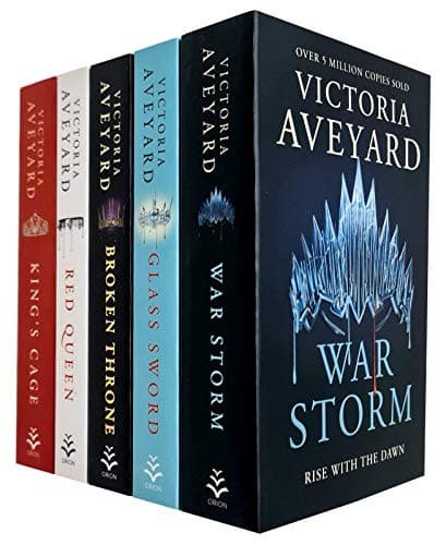 Five hardcover books by Victoria Aveyard in a collection set, featuring colorful spines: red for "King's Cage," red for "Red Queen," black for "War Storm," and blue for "Glass Sword," with titles prominently displayed.