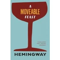 "A Moveable Feast" book cover with red wine glass silhouette on blue background, bold red and white text.