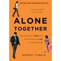 Orange cover book "Alone Together" by Sherry Turkle, features people using devices, subtitle on technology and relationships.