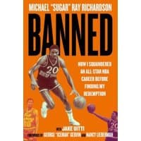 "Book titled 'Banned' with a basketball player in action, orange background, and bold black text."