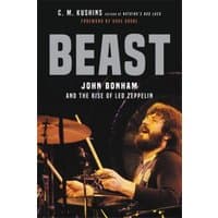 "Book titled 'Beast' featuring drummer playing a drum set, with bold black and white text on the cover"