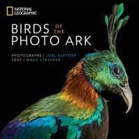"Birds of the Photo Ark book by National Geographic, featuring a colorful bird with vibrant feathers on the cover."