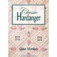 "Classic Hardanger book with intricate embroidery patterns on beige cover by Sally Milner Publishing Pty Ltd"