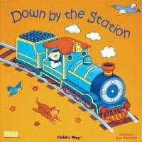 "Children's book 'Down by the Station' with blue train, conductor, orange background, and playful animals"