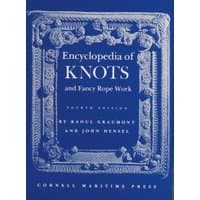 "Blue hardcover 'Encyclopedia of Knots and Fancy Rope Work' with intricate rope border design and white text"