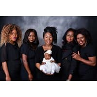 Family photoshoot package featuring five women and a baby, all dressed in black, with a dark studio backdrop.