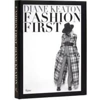 "Fashion First" book by Rizzoli, black cover with monochrome photo of a person in plaid coat and hat.