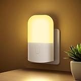 GRIFEMA night light plug-in with warm white glow, dusk to dawn sensor, white base, adjustable brightness, rounded top.