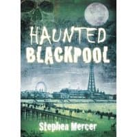 "Haunted Blackpool book cover with eerie skyline, skull, full moon, and Blackpool Tower in misty green tones"