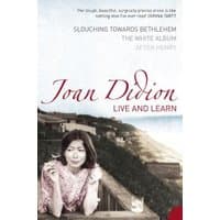 "Live and Learn" book by Vinyl Castle, cover featuring a woman in a floral dress with a coastal background.