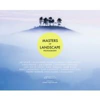 "Masters of Landscape Photography" book with misty hill and trees on cover, yellow circle title design.