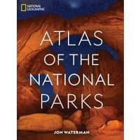 "National Geographic Atlas of the National Parks book with red rock arch cover and starry night sky"