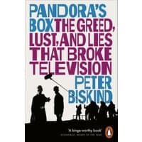 "Paperback book 'Pandora's Box' by Peter Biskind, bold text cover with silhouettes of TV crew and equipment."